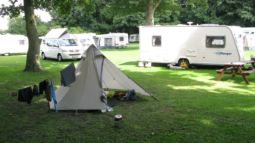 Camping on a caravan park. Wherrymans Way, 2014