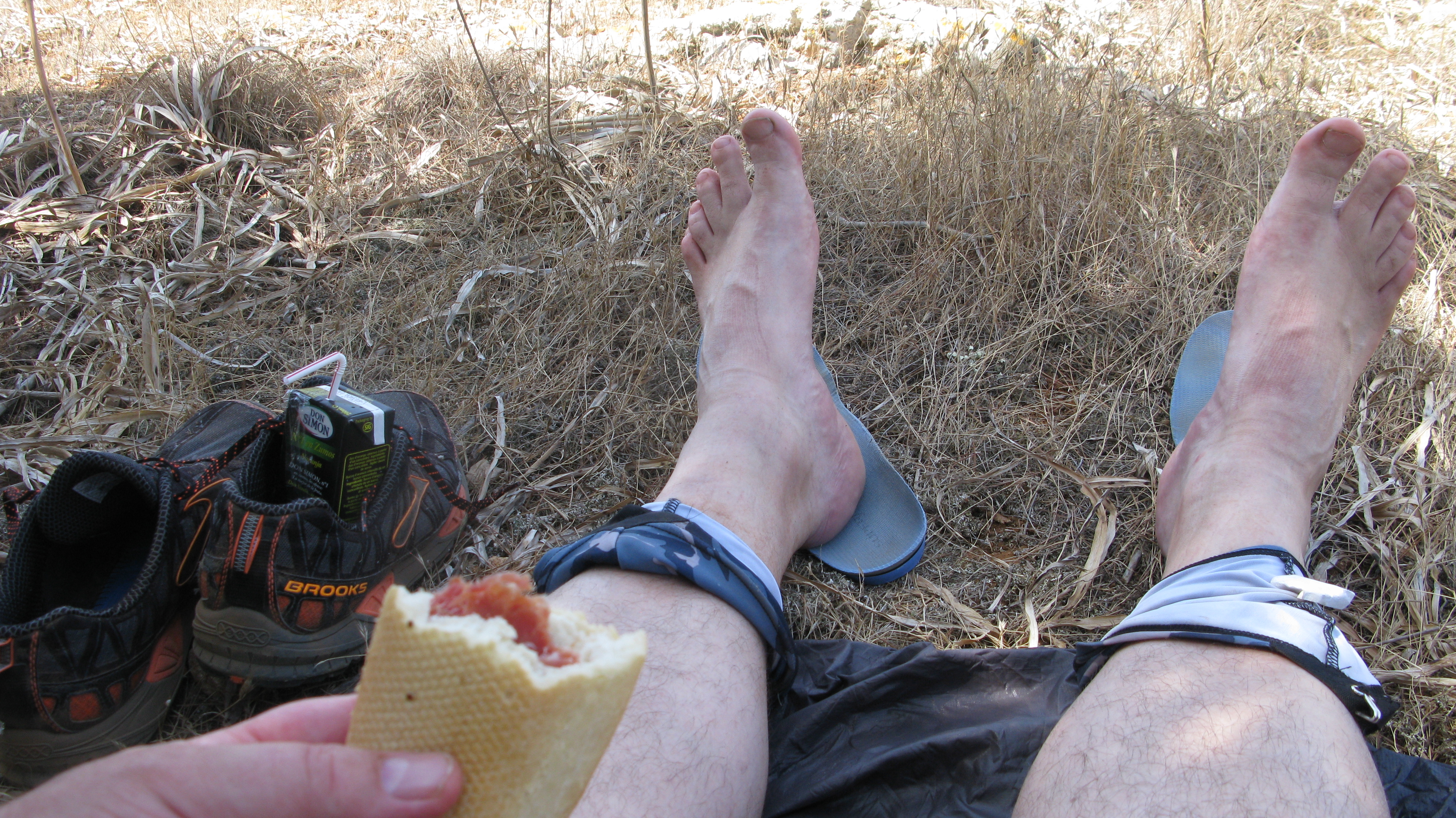Foot care isn't just left to the end of the day. It is something to be aware of throughout. Here, I am airing my feet during a lunch stop on the Camí de Cavalls GR223. Summer 2014