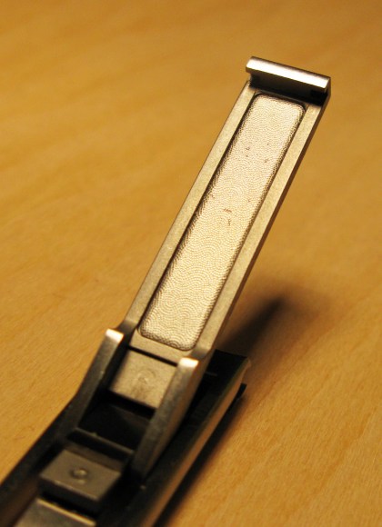 Nail file beneath top lever