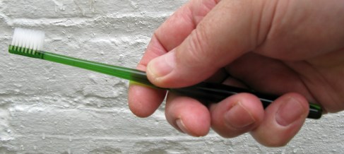 The full size Muji toothbrush. This small head toothbrush weighs 14g and is 180mm long