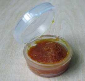 5g of Tiger Balm in 5g sample pot, total weight: 10g. A worthy addition to a first aid kit or ditty bag.