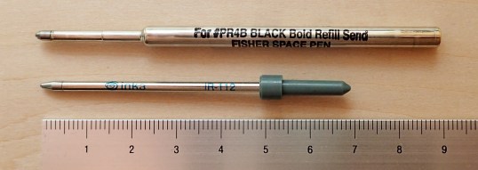 The Fisher cartridge appears to hold a larger amount of ink than the tiny Inka cartridge (bottom)