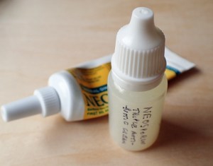 Tube of Neosporin antibiotic cream decanted into mini-dropper bottle.Minimal saving
