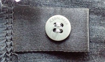 Spare 'little white button' on Icebreaker base-layer