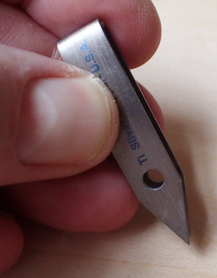 A small pair of Titanium Sliver Gripper tweezers are included in this kit. With holder, these weigh 4g (or 2.8g for those who wish to leave the holder at home)