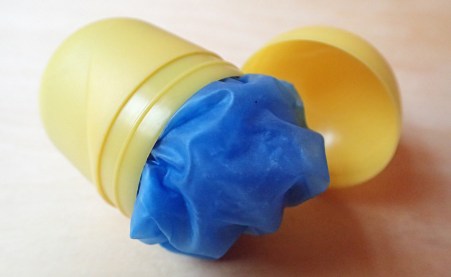 An effective alternative container for gloves is to use one of the small 4g plastic containers found in Kinder Surprise Eggs