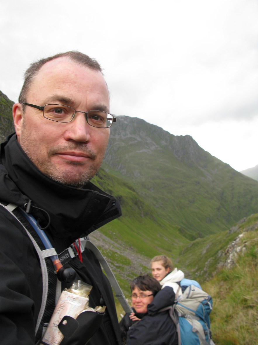 Three Points of the Compass and family (and O.S.) resting on A' Ghlas bheinn (918m), Scotland, 2012
