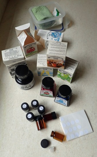 Six Winsor & Newton inks were transferred to small glass bottles