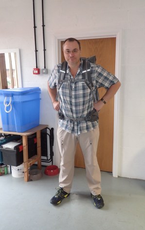 Trying a Gossamer Gear Mariposa pack for size and fit at Backpacking Lights offices