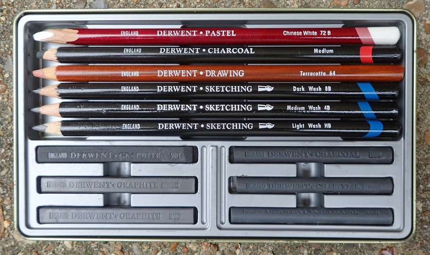 while it is great fun to track down and practice with different mediums and mix and match to form your own set, some useful sets are produced by many manufacturers. The twelve piece Sketching set from Derwent contains three water soluble sketching pencils, a medium charcoal pencil, terracotta drawing pencil and a chinese white pastel pencil. The three compressed charcoal and three compressed graphite sticks, in a variety of tones, also included, are perhaps less practical for the trail. For this reason, the Lyra Rembrant Art Specials set mentioned earlier is probably the better pre-assembled collection for the trail