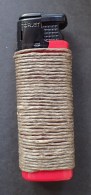 Torjet lighter, wrapped with Hemp Wick. Total weight- 24g