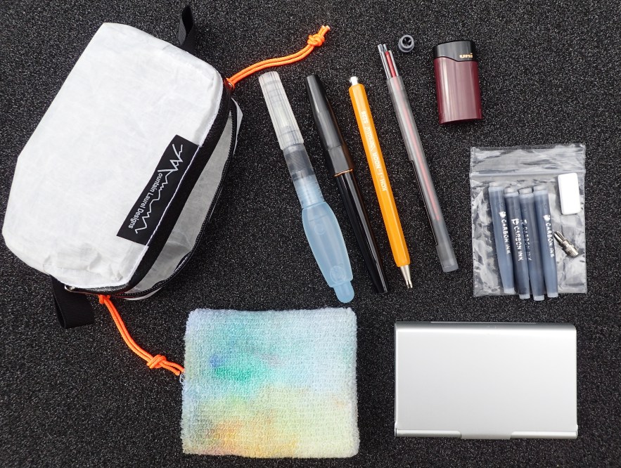 This is my complete art kit for multi-day hikes, other than my journal and a small ball point pen. The entire kit weighs 136g (4.8oz) and contains enough materials to last me many weeks