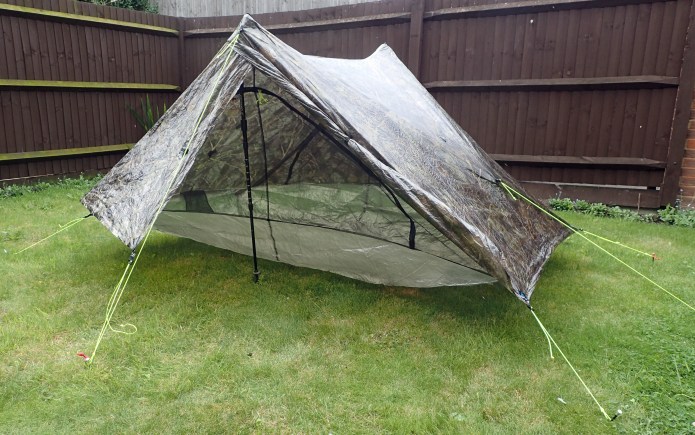 One storm door rolled back, there is a lot of room in each vestibule and the bucket ground sheet rises up quite some height from the ground