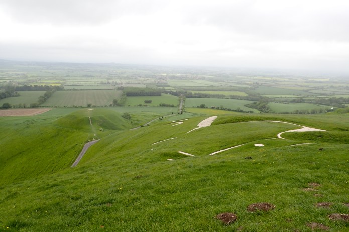 Just about the worst place to see a chalk-hill figure is standing next to it. Three Points of the Compass passed the top of Uffington Horse, cut into White Horse Hill, on the Ridgeway in 2016