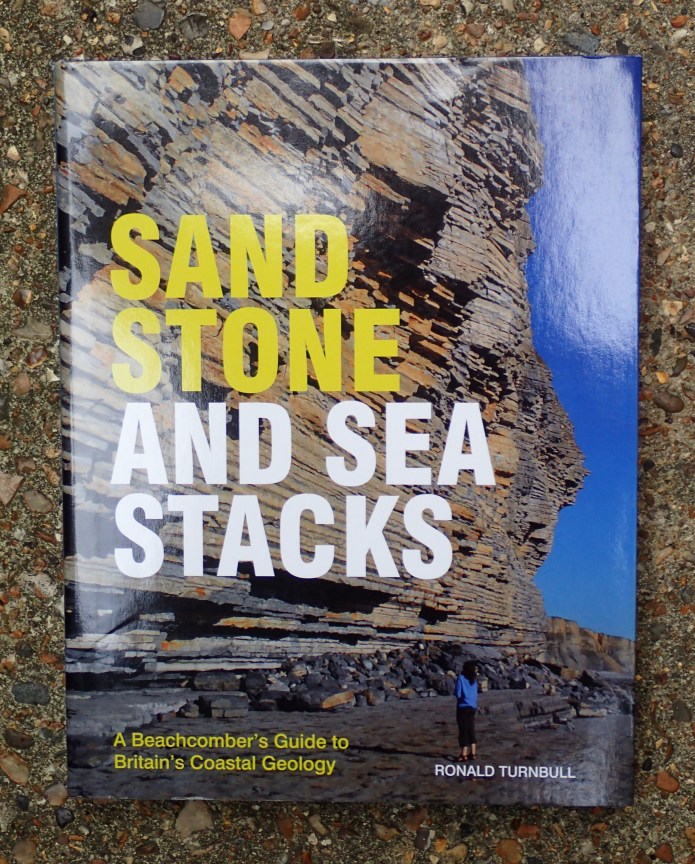 If you enjoy a ramble up the mountains with Ronald Turnbull, why not go and dip your toes in the sea with him with another of his books- Sand Stone and Sea Stacks does an admirable job of looking at how the sea has shaped and continues to shape and create the coastline encircling our island