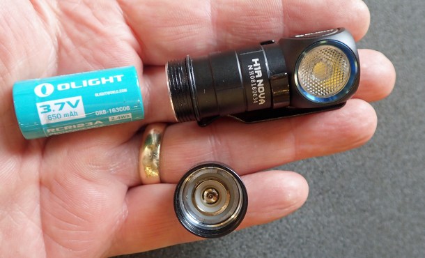 The H1R Nova has a single rechargeable 3.7V 650mAh RCR123A battery. This has built in protection. A spare could be taken so as to swap out with ease. However I just take the one. Each battery weighs 18g