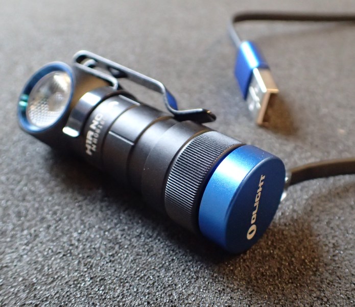 The 14g Olight charge lead is a handy little addition. It attaches magnetically firmly to the base of the Nova.