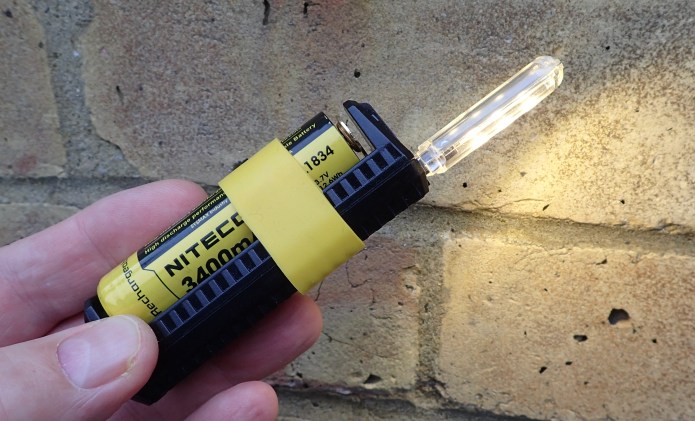 Mini LED lights can be plugged into any USB port, here, one is in use combined with my Nitecore F1