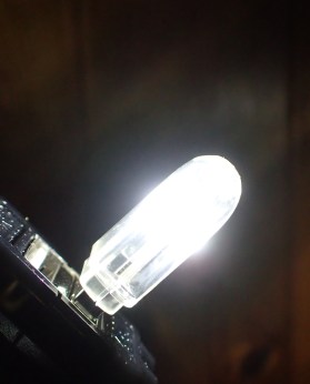 A hard bright white is emitted from this two sided LED light