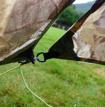 Fraying, strained and worn tie out points on tent vestibule