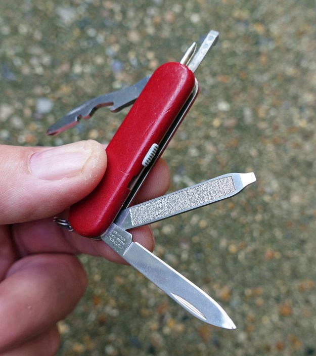 The Victorinox Talisman is the third choice of Three Points of the Compass as a knife particularly suited for use on trail. It has a small but useful set of tools- small blade, nailfile with flat screwdriver tip, cap lifter, wire stripper, Phillips screwdriver, tweezers and ball point pen