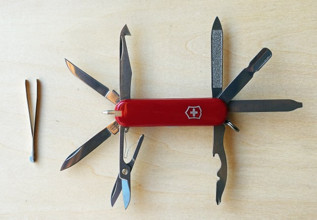 Later version of the MiniChamp (formally known as the MiniChamp II) was extended to a five layer tool to include the useful combination tool. This version also includes a retractable ball point pen in one of the scales. However some, if not most, of the tools are superfluous on trail