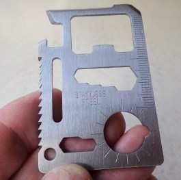 Cheaply made, pressed stainless steel pocket sized tool is of limited use today. The finish on these bits of kit is extremely poor