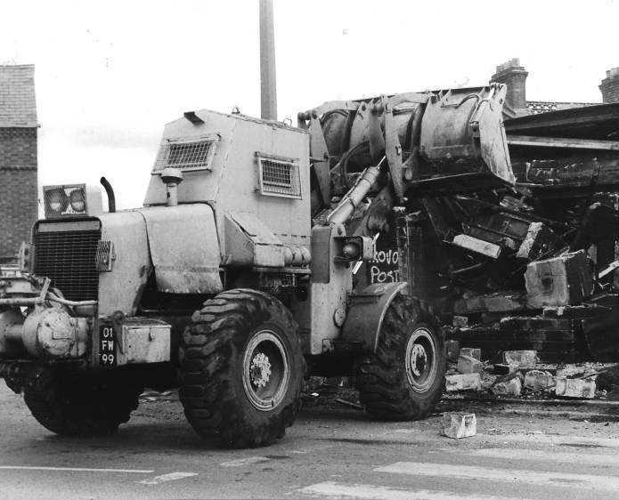 1984 and 1985 was spent in Northern Ireland. There was little room in the cramped cab of an armoured Allis Chalmers wheel loader. Occasionaly an SMG could be thrown behind the seat while working, but invariably, all that we were armed with was our clasp knife