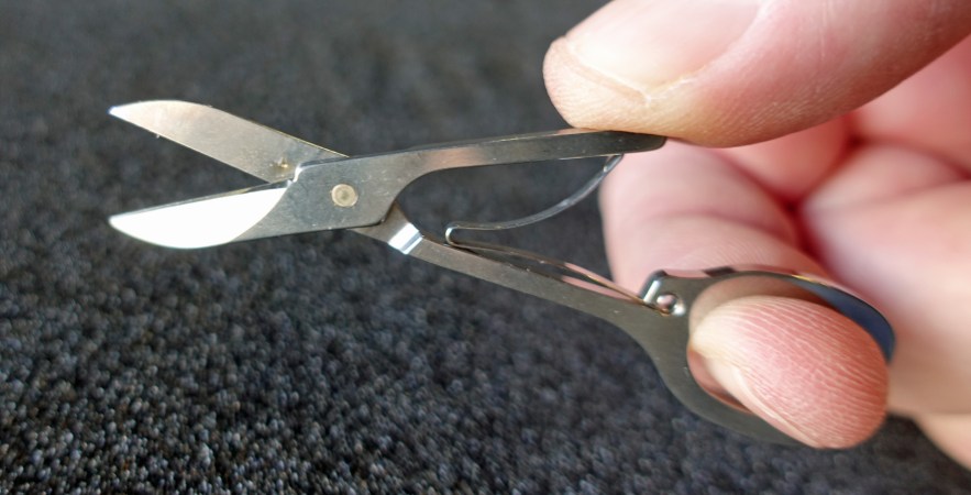 The 6.7g scissors from a Victorinox SwissCard are are an excellent efficient choice for a First Aid Kit