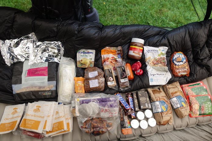 The contents of my food bag photographed midway through the 177 mile Offas Dyke in 2018. I see that I had managed to locate Kind bars somewhere and a solitary one remains as a treat