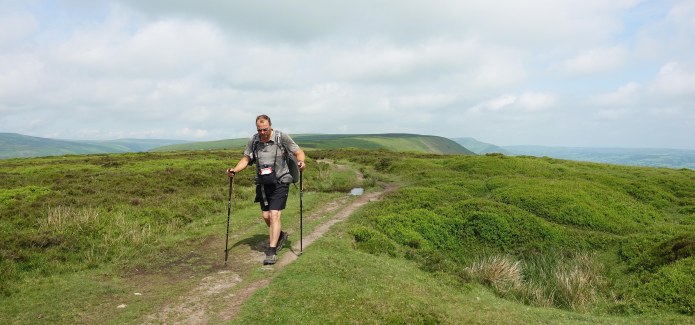 It is pure miles and miles of hiking, washing gear in streams, sinks and shower trays. Sun, rain, hot and cold. Brambles, thorns, heather, gorse, barbed wire and rocks, that all combine to wear down the daily trekking clothing. Wear good quality gear from reputable manufacturers that have tested their gear over tens of thousands of miles. Clothing will wear out, of course it will, but I found that Champion 365 shorts or Montane Terra pants, Rohan merino polo shirt and synthetic ExOfficio baselayers lasted fine months of hiking. Black Mountains, Offa's Dyke, Jun 2018