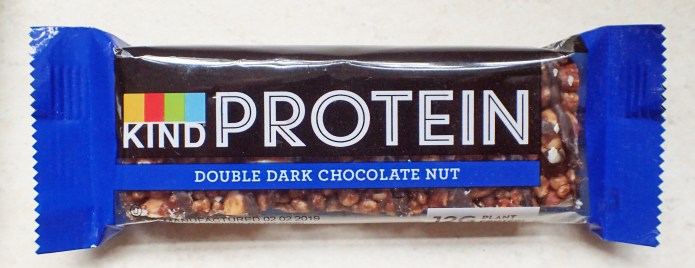 50g Kind double dark chocolate nut Protein bar. This provides 12g of protein and 249 kcal
