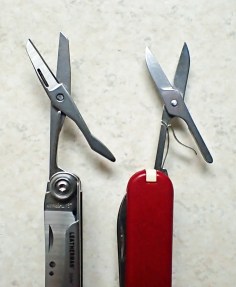 Small Leatherman scissors compared with those on Victorinox Classic