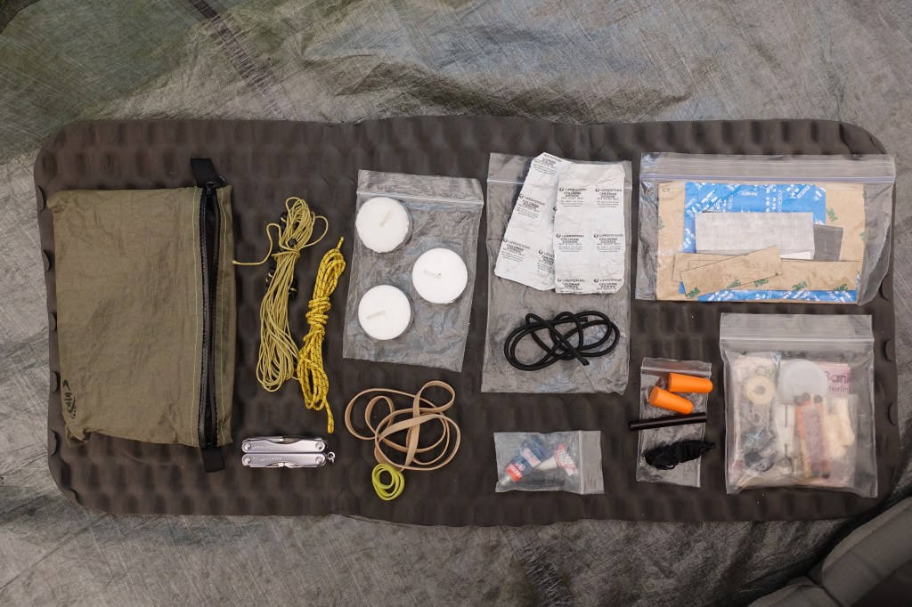 The ditty bag/repair kit that Three Points of the Compass carried on the Cape Wrath Trail in 2018. A Leatherman keychain multi-tool formed a vital component of this