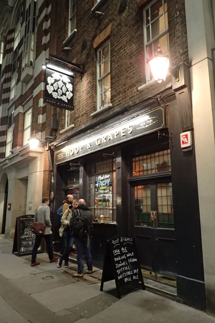 Hoop and Grapes, standing between modern buildings, it dates from 1721