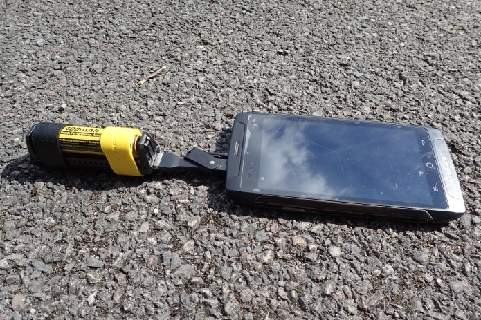 Charging phone on trail with Nitecore F1 battery charger/power bank