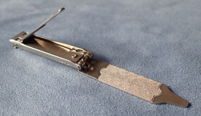 Small nail file beneath the clipper lever