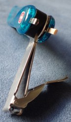 Tweezers and toothpick are slotted into the scales of Wenger Swiss Clipper