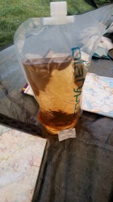 Peaty brown water may look unpalatable but is fine to drink, particularly after the addition of a couple of chemical sterilisation tablets. Sandwood Bay, Sutherland, NW Scotland