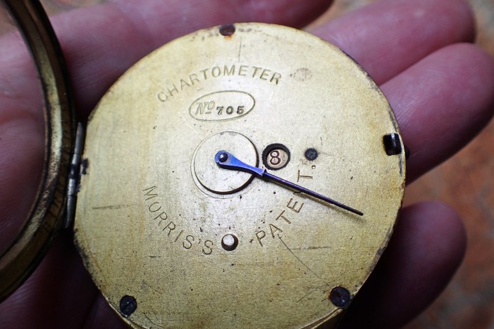 Face of Chartometer without scale card inserted. Revolution counter can be seen to the right of the hand. The lower stud protrusion ensures an inserted cart is correctly orientated