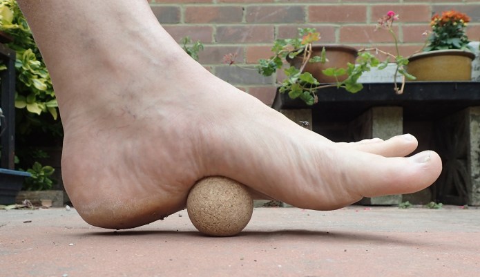Rolling out foot on hard cork ball
