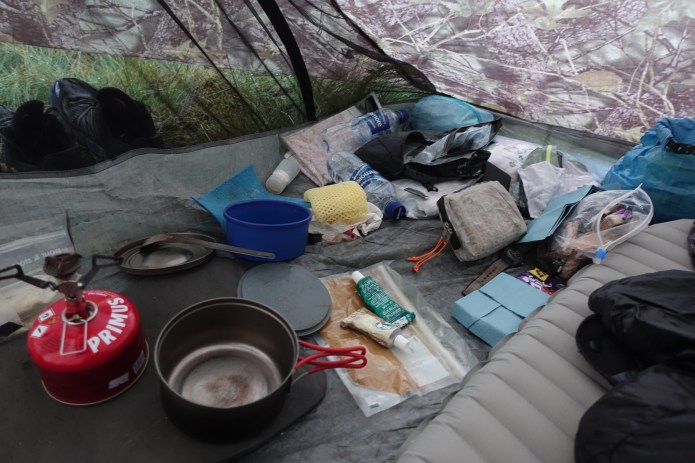 The usual 'pack explosion' at the end of a days hiking. Keeping gear comparmentalised ensures items can be found when reuqired and nothing gets lost