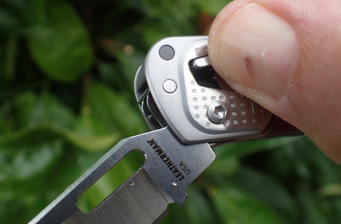 Release clips to unlock the tools are situated at each end of the tol and are 'fairly' easy to use