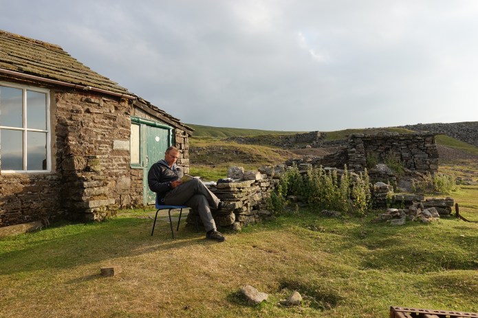 Sitting outside Gregs Hut waiting for the sunset