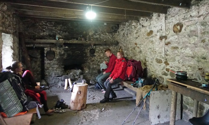 I stoped in at Coire Thollaidh bothy for a lunch halt. Hiking with two polish girls, Ania and Magda, it was a convenient halt to dry off feet