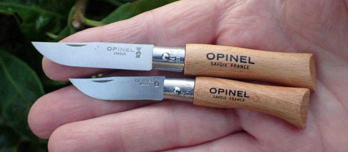 Opinel Numbers 3 and 4. Either of these would make a great, cheap and effective lightweight knife for use on trail