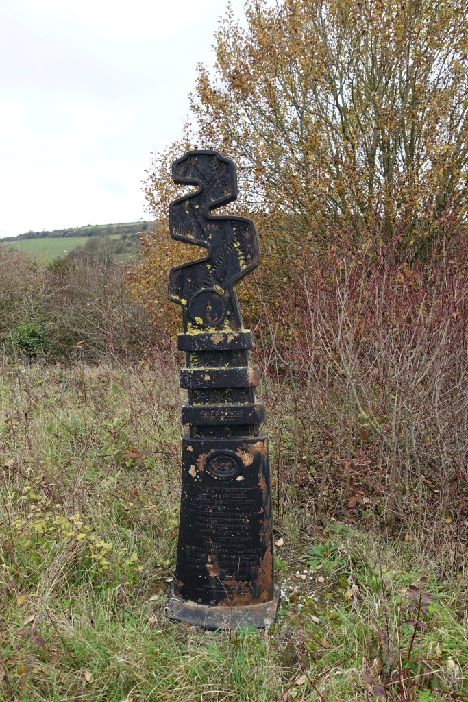 A Tracks milepost that has lost its fingers. Passed on the South Downs Way, 2018