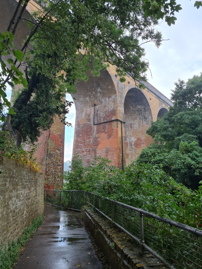 Route passes beneath ten-arch bridge built for the London, Chatham & Dover Railway Company in 1860