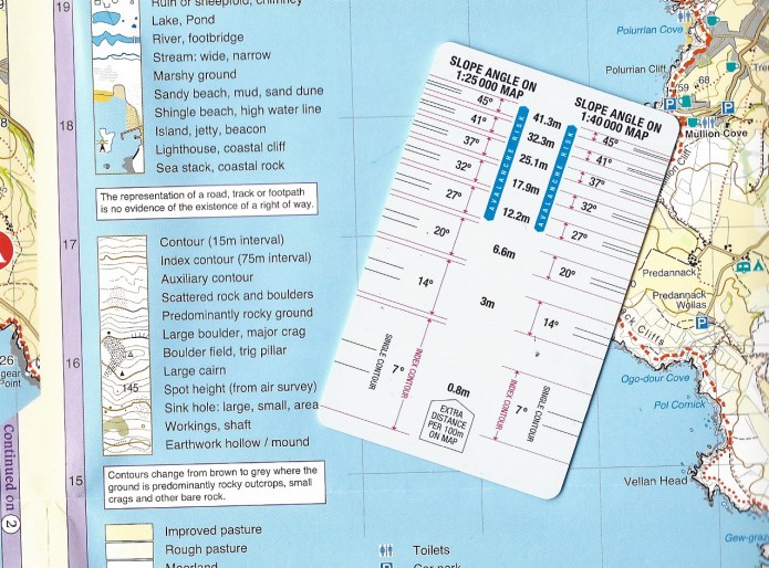 If using a slope card, it is essential to cheack that the right card is used for both the scale of map and the contour intervals used on that map. This sheet is the South West Coast Path 3 1:40 000 map from Harvey. The Key shows that Index contours (thick lines) are drawn at 75m intervals, while contours beterrn these are at 15m intervals. Shaven Raspberry sell a card, shown here, specificlly for this scale and contour interval, and can also be used on other 15m contour interval maps