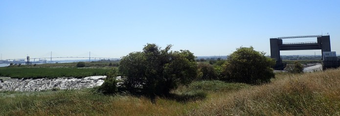 Turning inland away from the Thames. The large Dartford road crossing in the distance and the crucial Dartford Creek Flood Barrier to the right